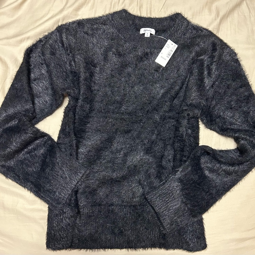Black feather yarn fuzzy sweater.